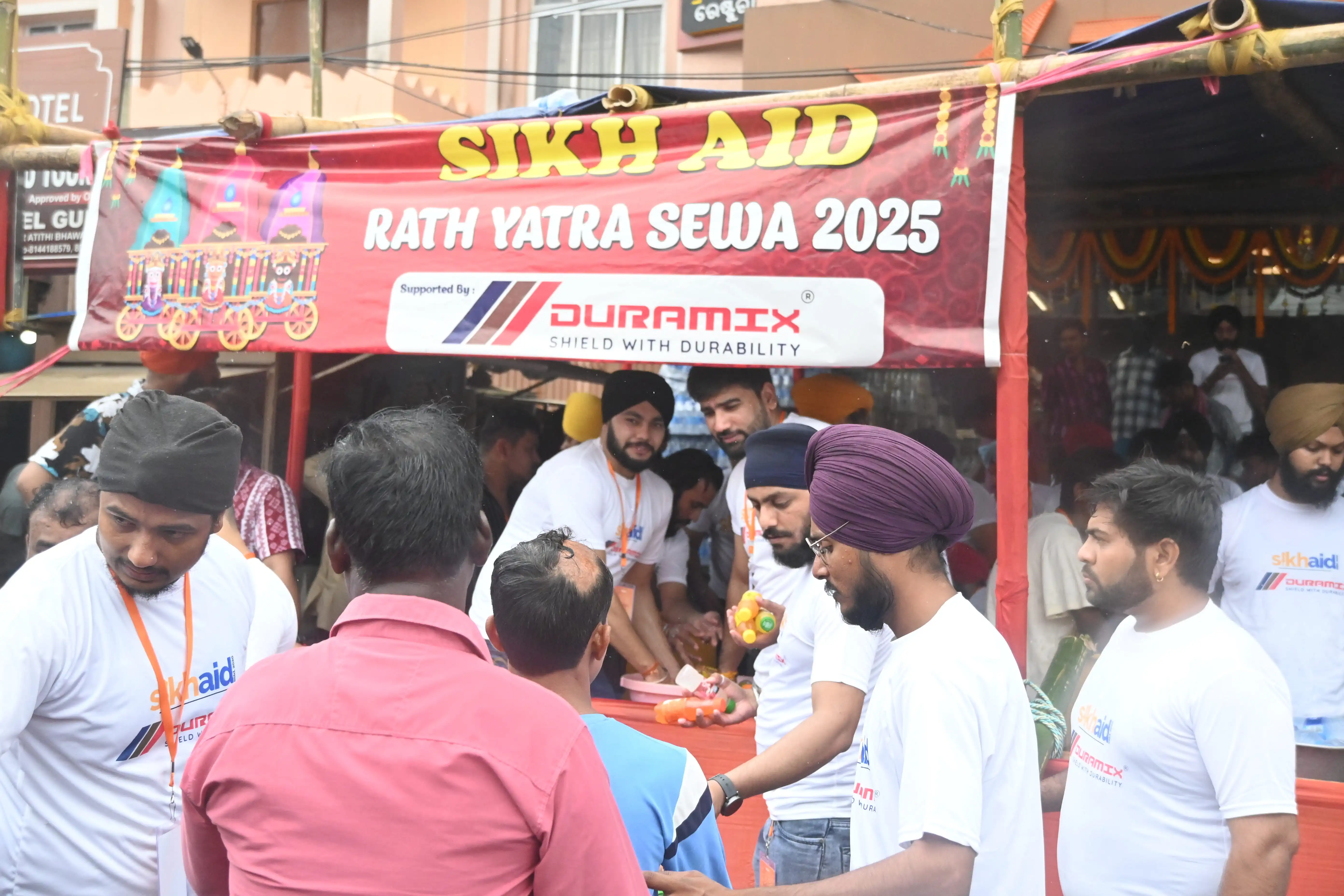 Sikh Aid volunteers preparing relief supplies for the 2025 Ratha Yatra seva drive
